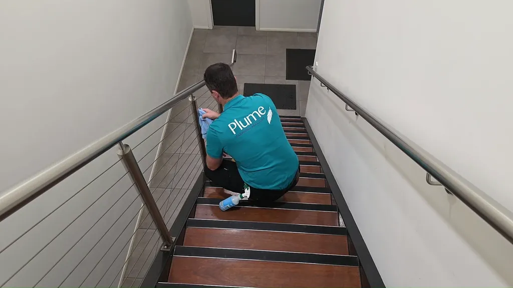 Joel polishing steel stairs
